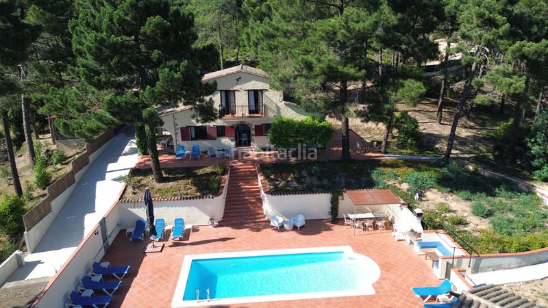 Foto e3770fdb-14b6-4d4f-a93d-2f1e0f487f46. Casa amb xemeneia calefacció aparcament piscina a Lloret de Mar