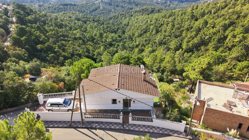 Foto 1dd2e766-8339-4f9c-b051-cc636c20d64f. Casa amb xemeneia aparcament piscina a Lloret Blau - La Creu de Lloret Lloret de Mar