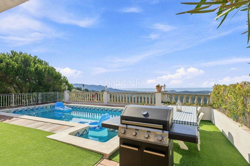 Foto 57c06fa7-e5bf-46d2-b337-ebd7c033b480. Casa amb xemeneia aparcament piscina a Lloret Blau - La Creu de Lloret Lloret de Mar