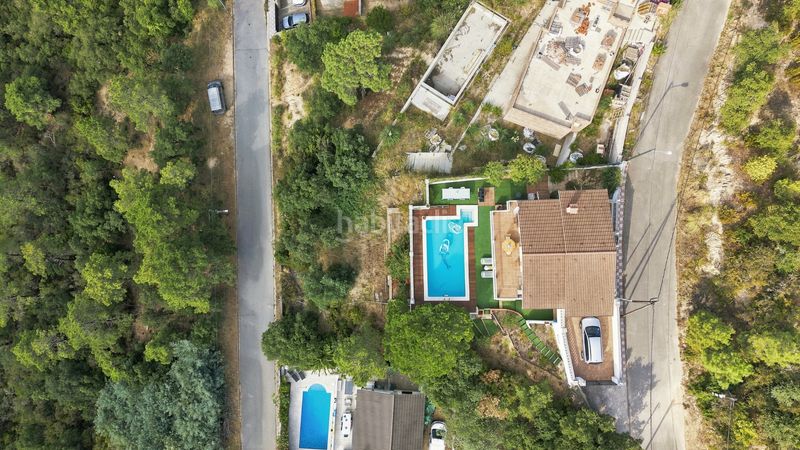 Foto b4cb02e3-8094-4d91-be08-46f8ae2312f0. Casa amb xemeneia aparcament piscina a Lloret Blau - La Creu de Lloret Lloret de Mar