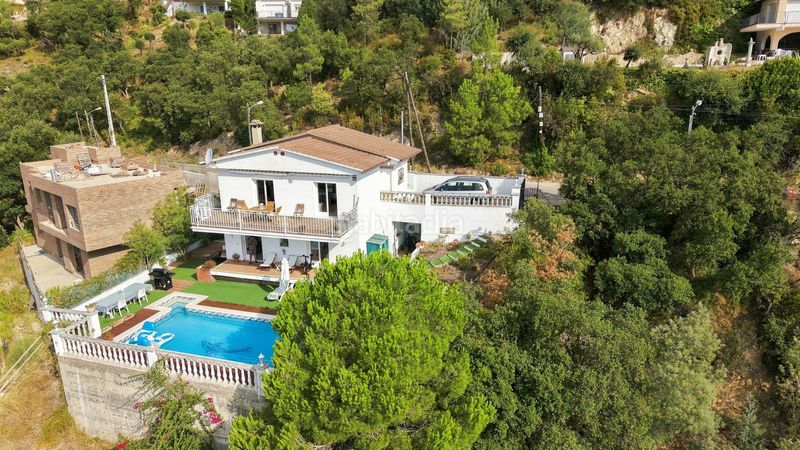 Foto c58df716-4af6-4683-8e79-0ec4fba72f04. Casa amb xemeneia aparcament piscina a Lloret Blau - La Creu de Lloret Lloret de Mar