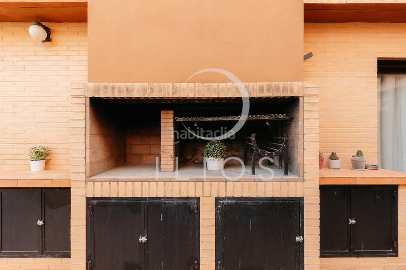 Foto 87a68e1d-938f-4a34-90b2-631ff27de3ad. Casa aparellada amb xemeneia calefacció aparcament piscina a Bétera