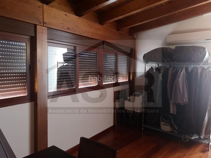 Foto 27c9f477-f087-49df-a9ae-6e6056403331. Haus mit parking in Sants Patrons Alzira