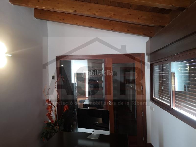 Foto 4c512f0c-20ec-4530-af0e-0ec54f3304c3. Haus mit parking in Sants Patrons Alzira