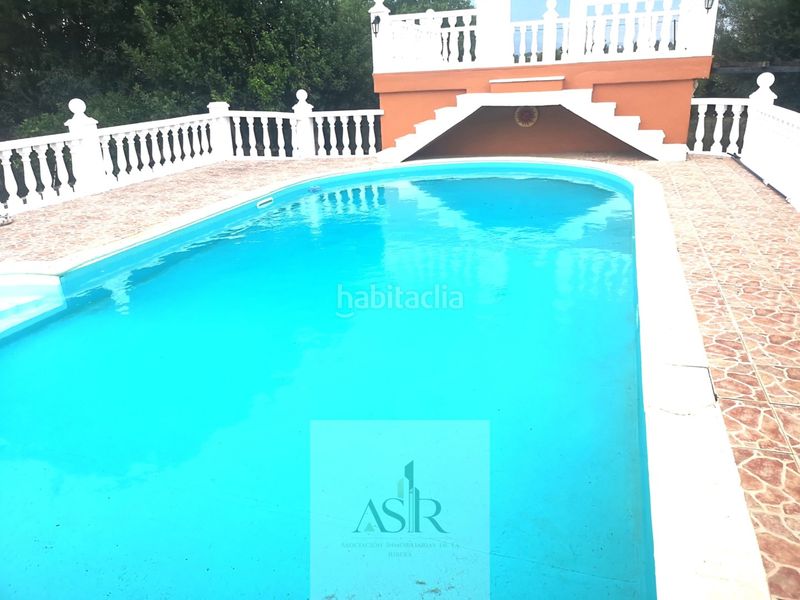 Foto a37d82e7-4762-4e8f-bbe2-eb66fa60bd78. Casa amb piscina a Urbanitzacions i Pedanies Nord Alzira