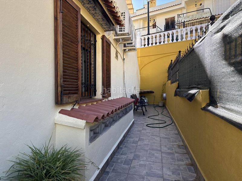 Foto 49d4588a-651a-42e0-891f-7f03803a5052. Casa adossada amb piscina a Urbanitzacions i Pedanies Sud Alzira