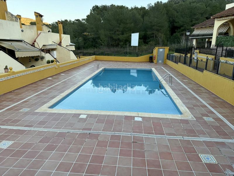 Foto a00b7c84-bbc1-476d-afd1-7b8843eb7556. Casa adossada amb piscina a Urbanitzacions i Pedanies Sud Alzira
