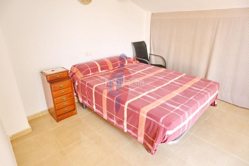 Foto 429c2231-cf88-48b7-96cf-a98f23d6c560. Casa adosada en calle palomina 1 bungalow de dos plantas y parcela con piscina comunitaria en pinomar en Guardamar del Segura