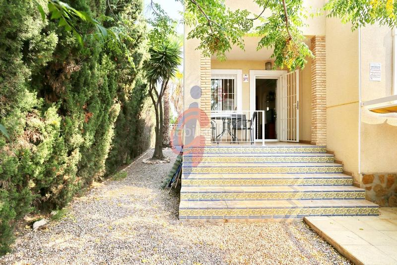 Foto 5804e6cf-3faf-45f7-80af-febe4782dafc. Casa adosada en calle palomina 1 bungalow de dos plantas y parcela con piscina comunitaria en pinomar en Guardamar del Segura