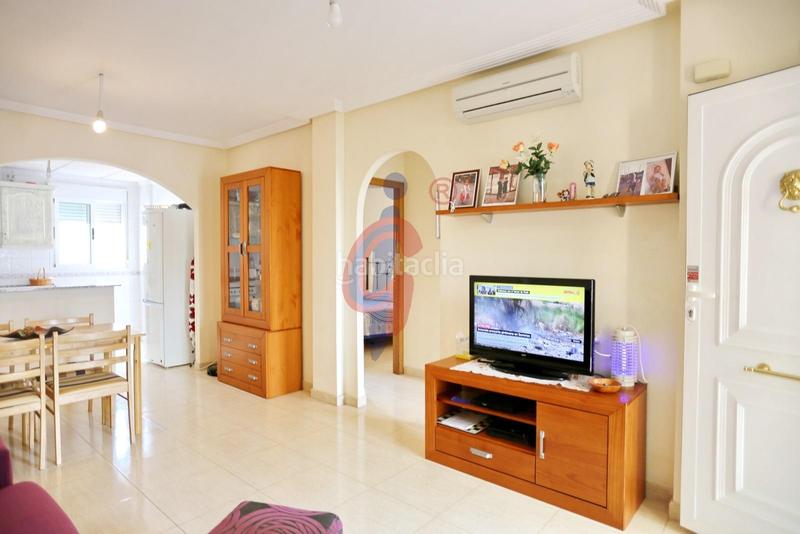 Foto 66271b7a-4bd7-476b-b3df-64b88717530b. Casa adosada en calle palomina 1 bungalow de dos plantas y parcela con piscina comunitaria en pinomar en Guardamar del Segura