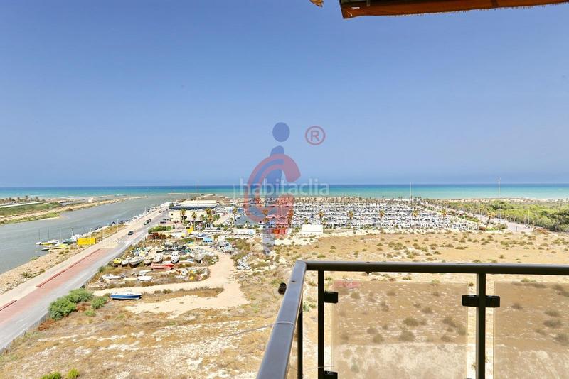 Foto 1d796d69-6d39-4788-9a0e-73cbd5fc8c0e. Apartamento en calle médico basilio paredes 19 luminoso apartmaento de 3 dormitorios con espectaculares vistas al mar y al río en la exclusiva urbanización puertomarino, guardam en Guardamar del Segura