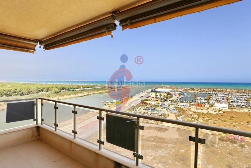 Foto a3ec6c7e-08e1-42d4-afe1-79380c6c276b. Apartamento en calle médico basilio paredes 19 luminoso apartmaento de 3 dormitorios con espectaculares vistas al mar y al río en la exclusiva urbanización puertomarino, guardam en Guardamar del Segura