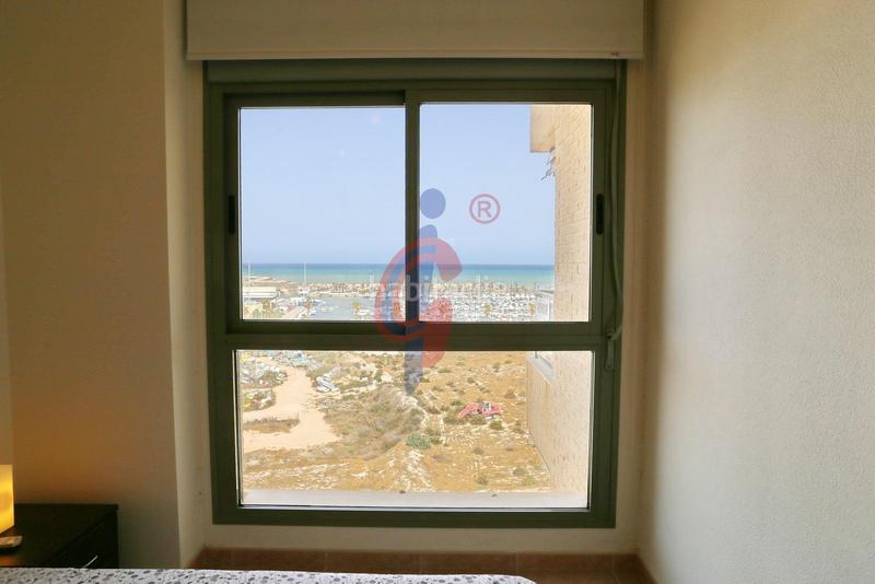 Foto a69e3325-0a76-4c14-83c5-6b0bf72c1c5c. Apartamento en calle médico basilio paredes 19 luminoso apartmaento de 3 dormitorios con espectaculares vistas al mar y al río en la exclusiva urbanización puertomarino, guardam en Guardamar del Segura