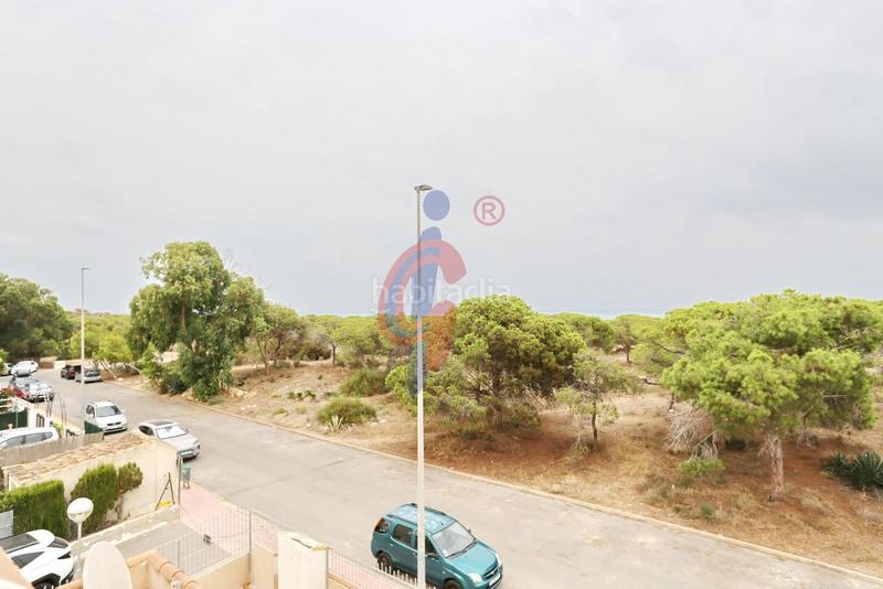 Foto b5fec49c-da0c-49ff-bbd2-768c942bf4b9. Casa adosada en calle sorell 20 oportunidad en pinomar, ! acogedor bungalow en venta, a solo 400m de la playa en Guardamar del Segura
