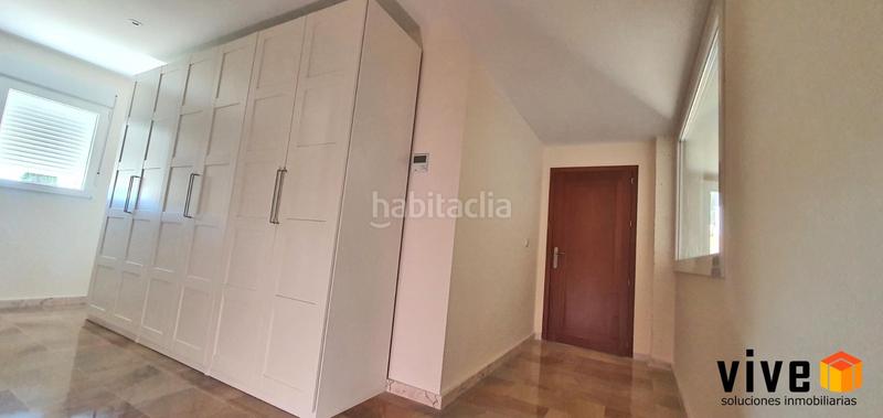 Foto 0134b18f-7cf6-4a0e-8b47-d799731bc04f. Location chalet avec parking dans El Zaudín - Club de Golf Bormujos