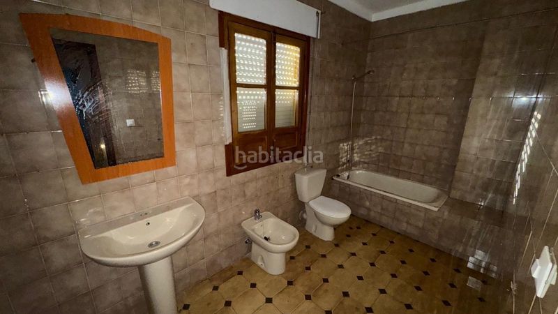 Foto 1ae96d81-59fb-47ab-8cf6-0fed1f2e4686. Casa adossada a Marchena
