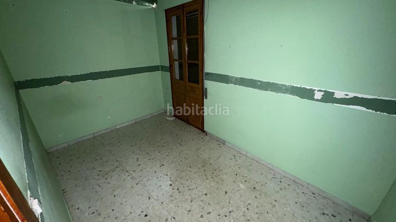 Foto f789cf2c-c0c1-4610-9bb3-8bab0ac67143. Casa adossada a Marchena