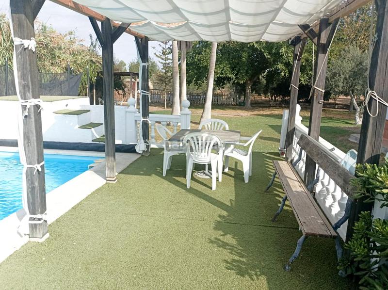 Foto f3fbfd3a-fbb4-4054-85f2-57926e05e20d. Xalet amb aparcament piscina a Pedanías Norte Utrera
