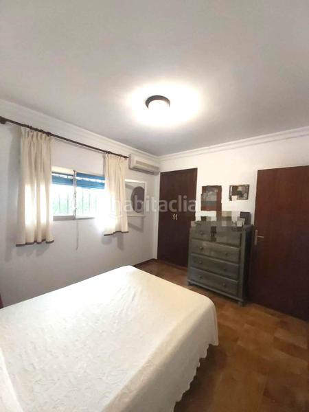 Foto e7b1ee95-3da4-4a81-905e-7c430e27ec4c. Chalet en exclusiva chalet urbano en zona residencial dos casas en una con impresionante piscina privada! en Utrera