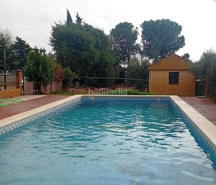 Foto 228236eb-0d59-4f87-8039-c00a6135428c. Maison avec parking piscine dans Pedanías Norte Utrera