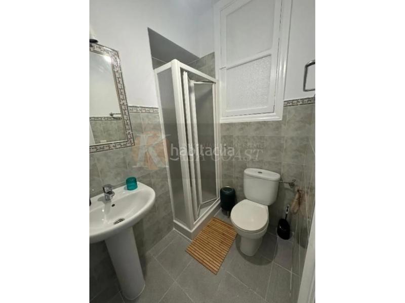 Foto 6e298e16-ce9a-4ff8-aeff-c098ee412369. Piso  en venta en Los Pacos, urbanización con jardín y piscina en Fuengirola