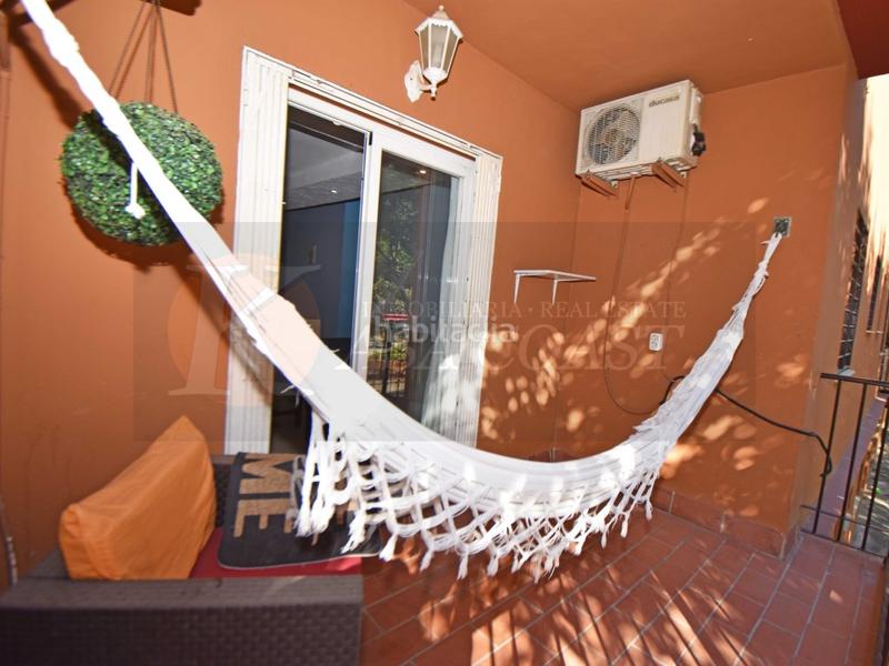 Foto 781b9d21-34bd-4c1e-9a4c-bb443d94ee5a. Piso  en venta en las lagunas, costa con terraza y garaje incluido en Mijas