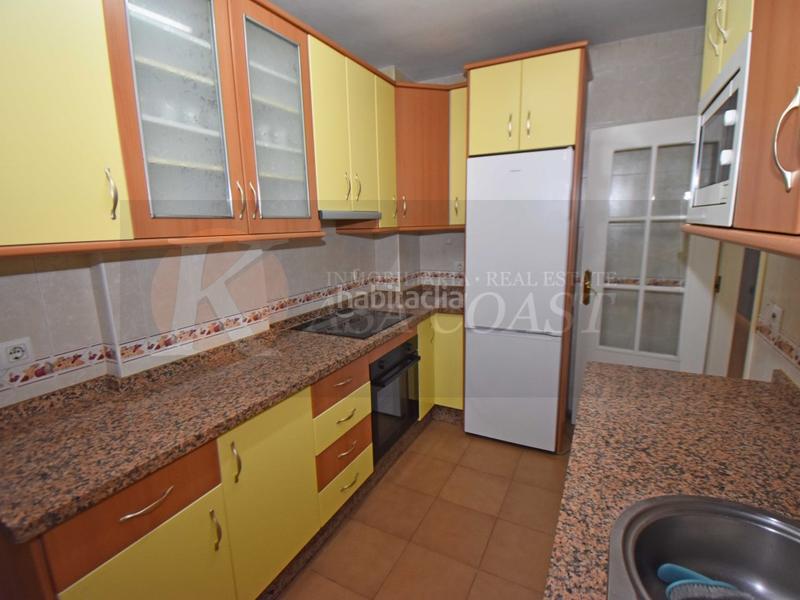 Foto 9d6375d8-d568-40f1-b181-ffd39f44778b. Piso  en venta en las lagunas, costa con terraza y garaje incluido en Mijas