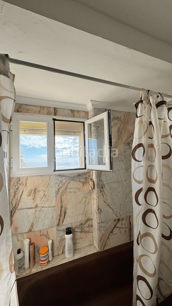 Foto 6061a985-f1a2-4a70-a090-c3bfc0abea56. Apartamento  en planta media de 3 dormitorios en Fuengirola