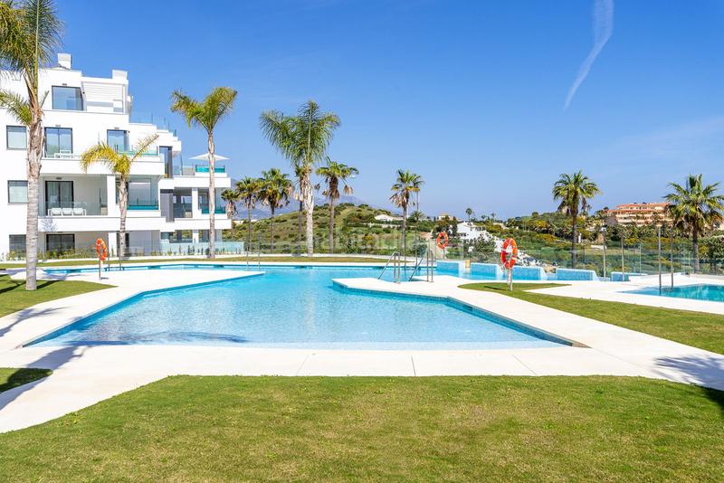 Foto 0641eab8-c74c-48b1-8c43-6cf76bd6d303. Apartamento  en planta media de 2 dormitorios en Mijas