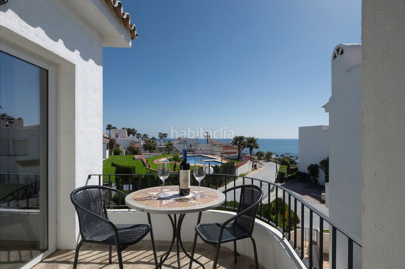 Foto 4c11d4d0-beb0-41cc-a455-e80e2e24ee33. Casa adossada amb calefacció aparcament piscina a Mijas