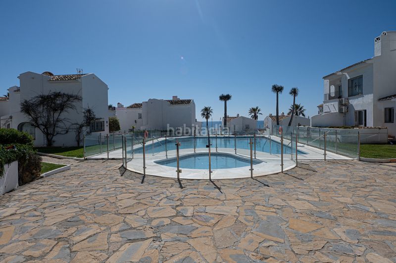 Foto 5654cd08-7b5d-4aea-a308-1b0ef8b2bb75. Casa adossada amb calefacció aparcament piscina a Mijas