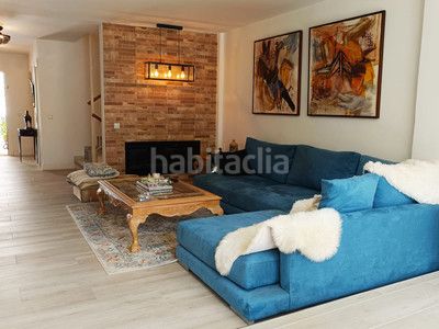 Foto f836380e-17b3-4d1f-abe9-cf193a16959a. Casa adossada amb calefacció aparcament piscina a Mijas