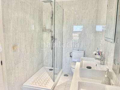 Foto 240f454b-83ce-46c2-a868-2a14cd587d98. Casa adossada amb calefacció aparcament piscina a Mijas
