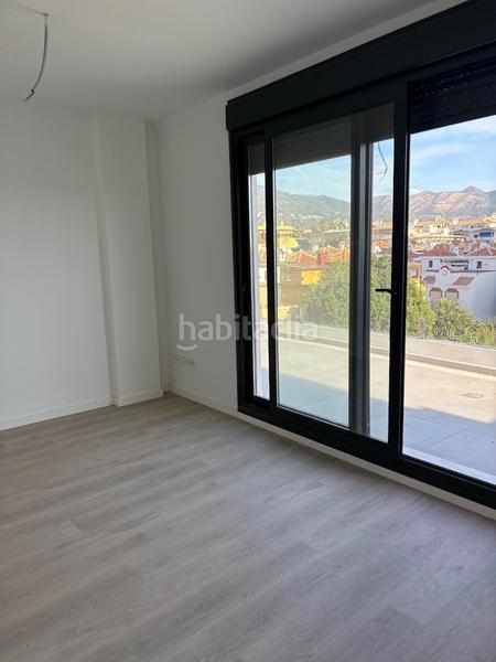 Foto 0332bdf9-786f-43a3-aa45-03b626a8652c. Attique avec chauffage parking dans Los Árboles Mijas