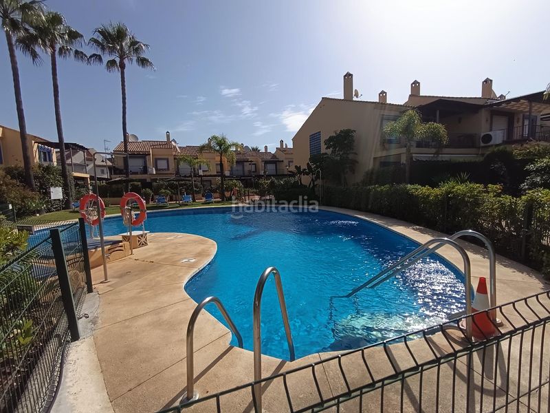 Foto 59d70eb1-08f6-45ec-a020-53fbefdc509f. Casa adossada amb aparcament piscina a Puerto Banús Marbella