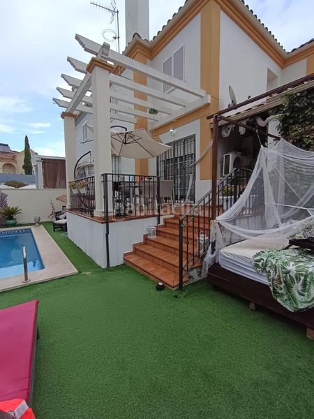 Foto 97335387-55d6-43c5-aab6-5843b9790209. Casa aparellada amb aparcament piscina a Paraíso Arenal - La Colina Córdoba