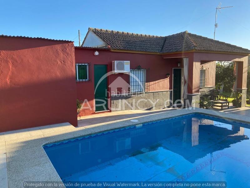 Foto 9f29a120-996d-41f0-a9fb-e28295f58ec2. Chalet dos chalets de una planta en suelo urbano en Alcalá de Guadaira