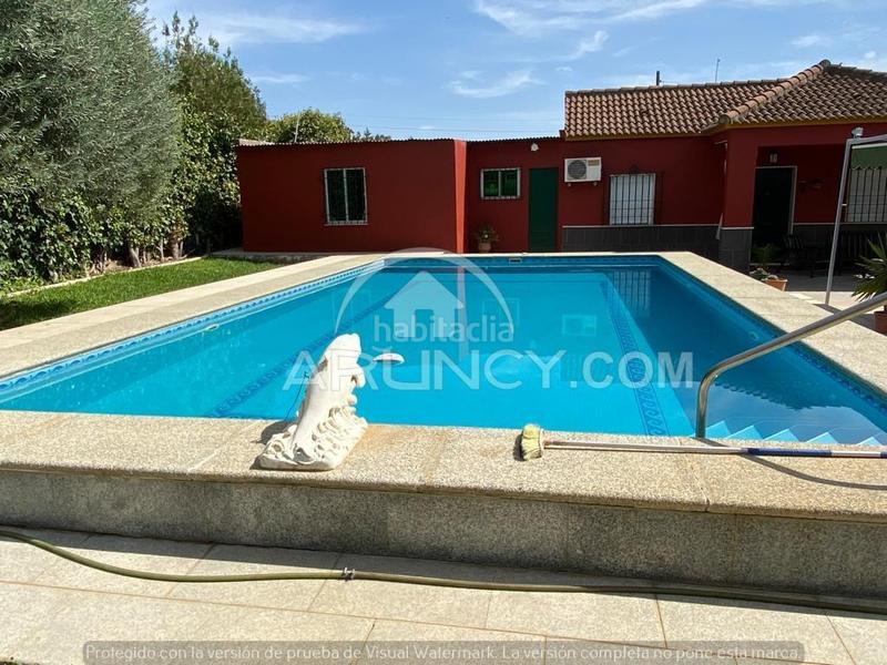 Foto cda43fe5-acb8-4fd2-b22d-d45ca5c16278. Chalet dos chalets de una planta en suelo urbano en Alcalá de Guadaira
