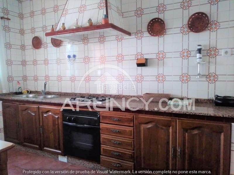 Foto ae624ff9-bdcc-4a57-8656-eb33e0af6a4f. Casa adossada amb aparcament a Centro Alcalá de Guadaira