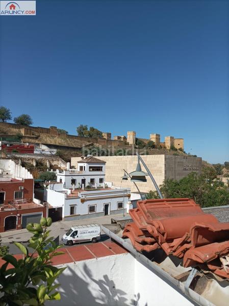 Foto 814be1c3-9c6a-4032-ada8-f34380a7e17d. Casa  en planta alta con bonitas vistas al parque oromana y el castillo en Alcalá de Guadaira