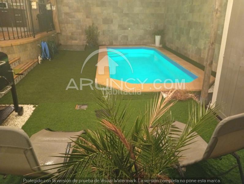 Foto 06f50cdd-d4b2-48bf-afe7-80564a594f35. Casa a schiera con riscaldamento parcheggio piscina in Alcalá de Guadaira