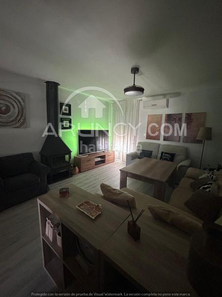 Foto 0c6d3e07-6ceb-409d-9306-a898dbe60304. Casa a schiera con riscaldamento parcheggio piscina in Alcalá de Guadaira