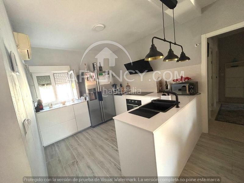 Foto 121a4191-96f0-4a5b-ae79-21d5a37b4127. Casa a schiera con riscaldamento parcheggio piscina in Alcalá de Guadaira