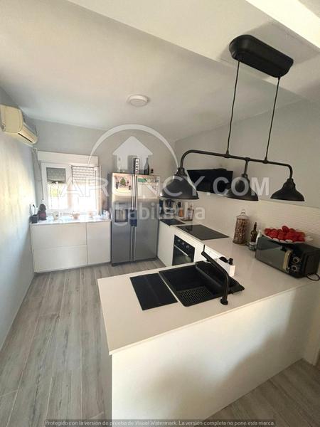 Foto 152e8ec9-bde9-46b6-88c3-c3c7cc857943. Casa a schiera con riscaldamento parcheggio piscina in Alcalá de Guadaira