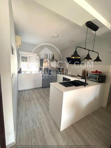 Foto 1631564f-363c-42c3-b4ed-36c37982b472. Casa a schiera con riscaldamento parcheggio piscina in Alcalá de Guadaira