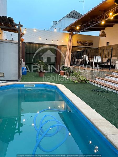 Foto 2d342ab2-93d4-4fcb-af63-d78f60d5bec8. Casa a schiera con riscaldamento parcheggio piscina in Alcalá de Guadaira