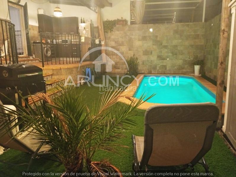 Foto 454ee533-faa2-4c60-8382-cdf47604ca81. Casa a schiera con riscaldamento parcheggio piscina in Alcalá de Guadaira