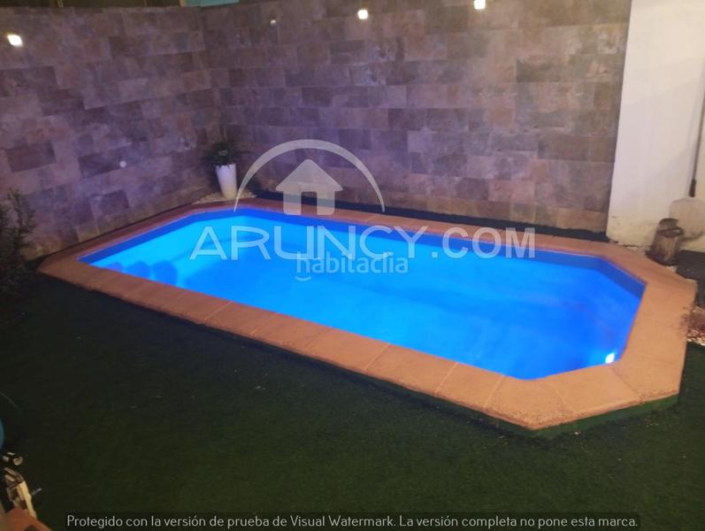 Foto a930e77e-55ee-48e0-9e4f-b64a9c11a98a. Casa a schiera con riscaldamento parcheggio piscina in Alcalá de Guadaira