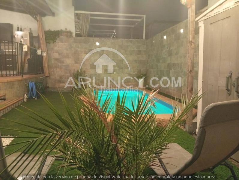 Foto b281f749-fcce-4fb0-8624-113bd8a61eb6. Casa a schiera con riscaldamento parcheggio piscina in Alcalá de Guadaira