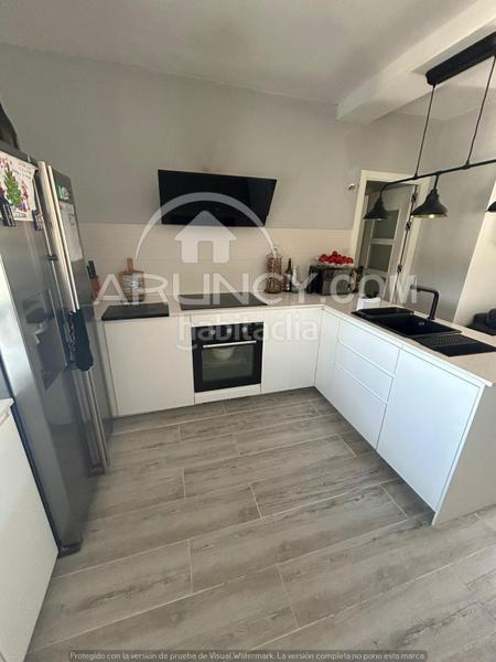 Foto dc456585-7b15-4d40-bdb8-499abdeade67. Casa a schiera con riscaldamento parcheggio piscina in Alcalá de Guadaira